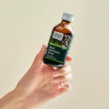 BlackElderberrySyrup_3oz_Hand_1060x.jpg